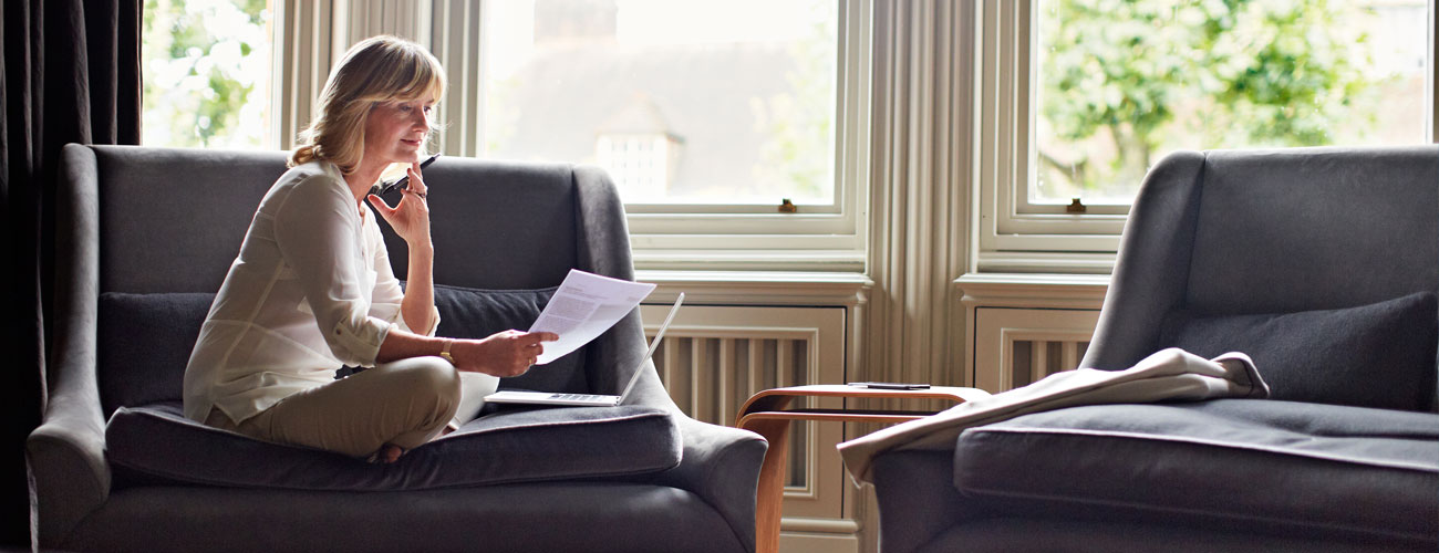 woman reading in chair