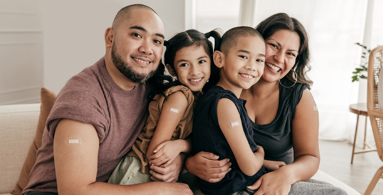 banner-immunizations Family showing that they all got vaccinated